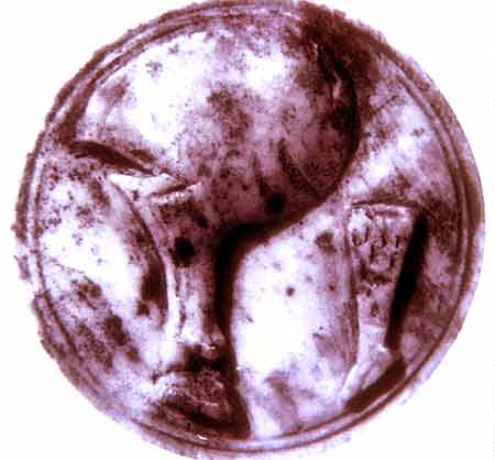 Gettone da gioco in osso raffigurante un cosciotto ed il piede di un porco: Egitto romano